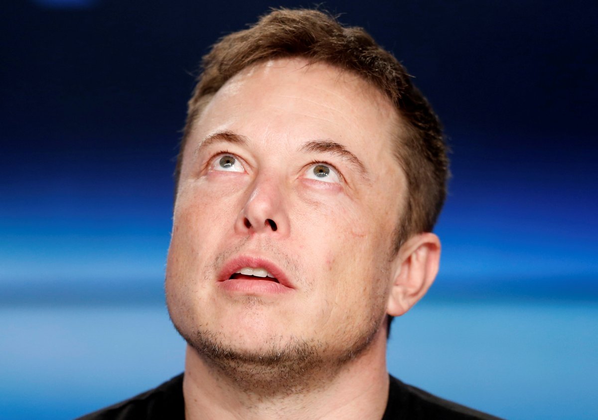 FILE PHOTO: SpaceX founder and Tesla CEO Elon Musk pauses at a press conference following the first launch of a SpaceX Falcon Heavy rocket at the Kennedy Space Center in Cape Canaveral, Florida, U.S., February 6, 2018.