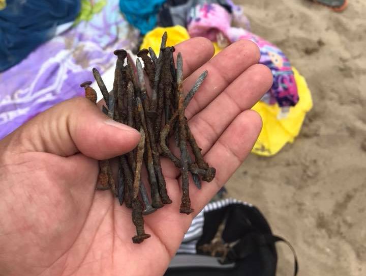 A handful of the rusty nails police say were located along the shoreline of Port Dover's main beach.