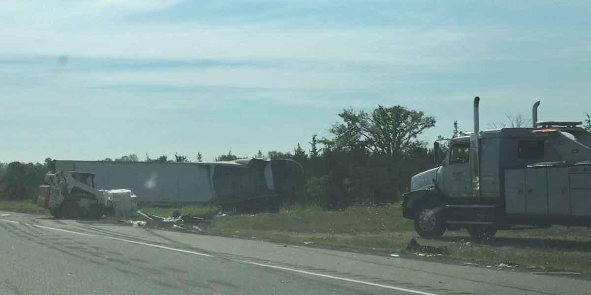 OPP say a Brampton man was charged with careless driving after two tractor trailers collided on Highway 401 near Napanee on Monday.