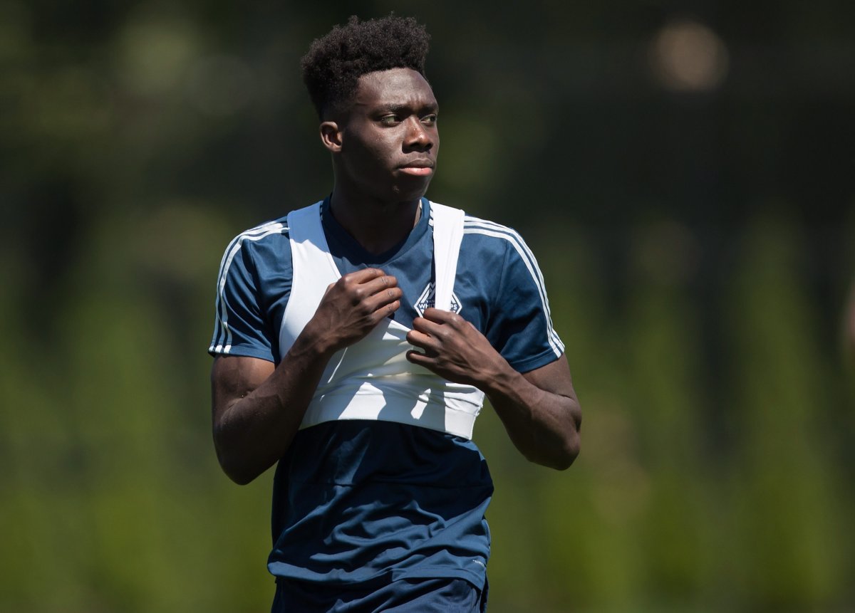 Vancouver Whitecaps midfielder Alphonso Davies leaves the field after MLS soccer team practice in Vancouver on Monday, July 23, 2018. 
