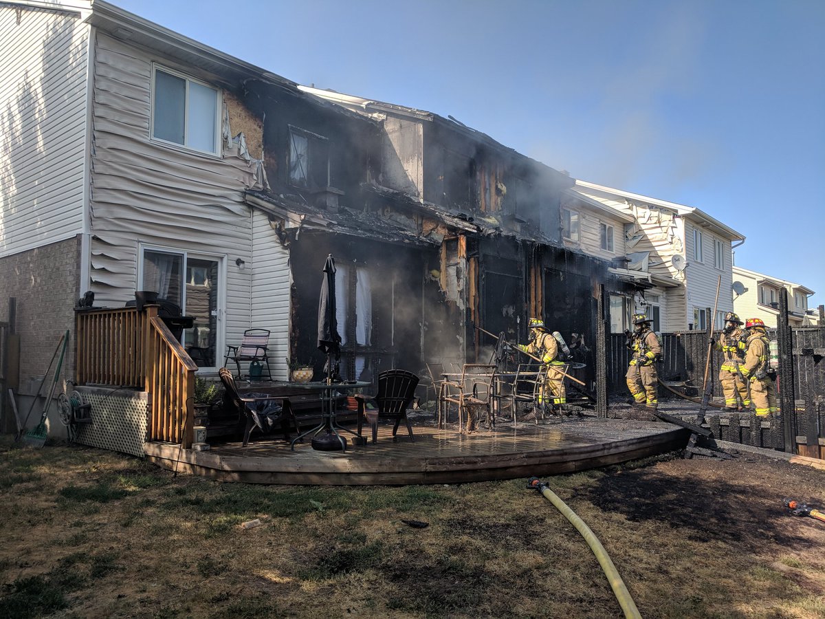 A fire heavily damaged three homes in Barrhaven Thursday afternoon leaving 15 homeless.