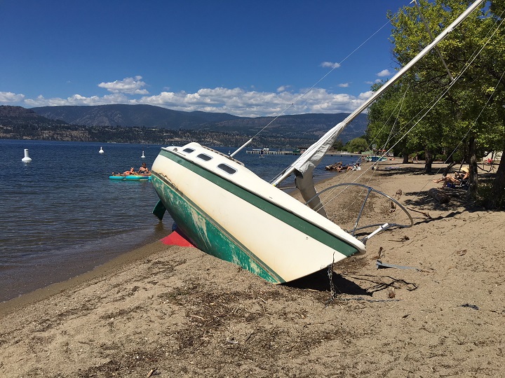 This sailboat, according to one local beach-goer, has been beached for some time.