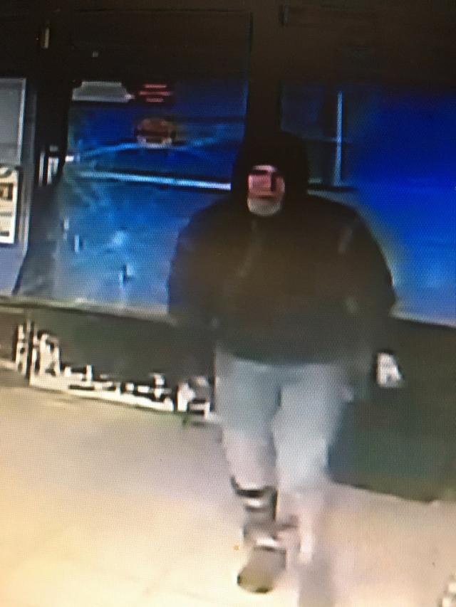 Barrie police are searching for a man (above) accused of stealing a donation jar from a business in Barrie.