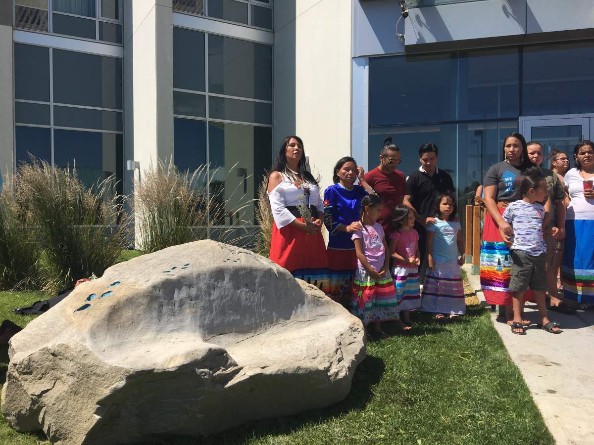 Laney’s family attend the ceremony of the stone carved bench