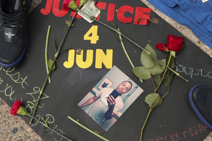 In this June 25, 2018 file photo, a memorial is set up in the alley where Thurman Blevins was killed by a Minneapolis police officer in Minneapolis.