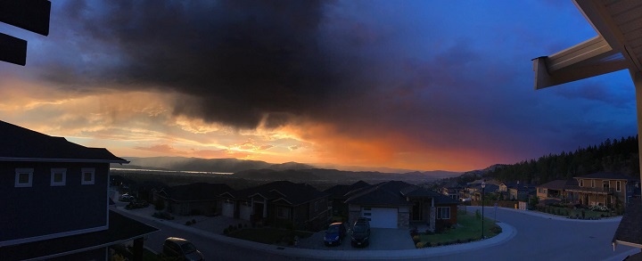 An evening photo of smoke gathering over the Okanagan from fires burning throughout the Valley.