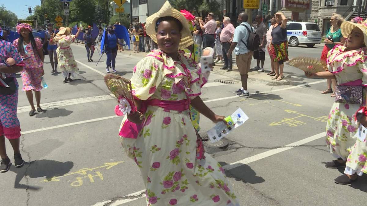 Participants in the 43rd annual Carifiesta parade along Rene Levesque Boulevard in Downtown Montreal. (Global News)