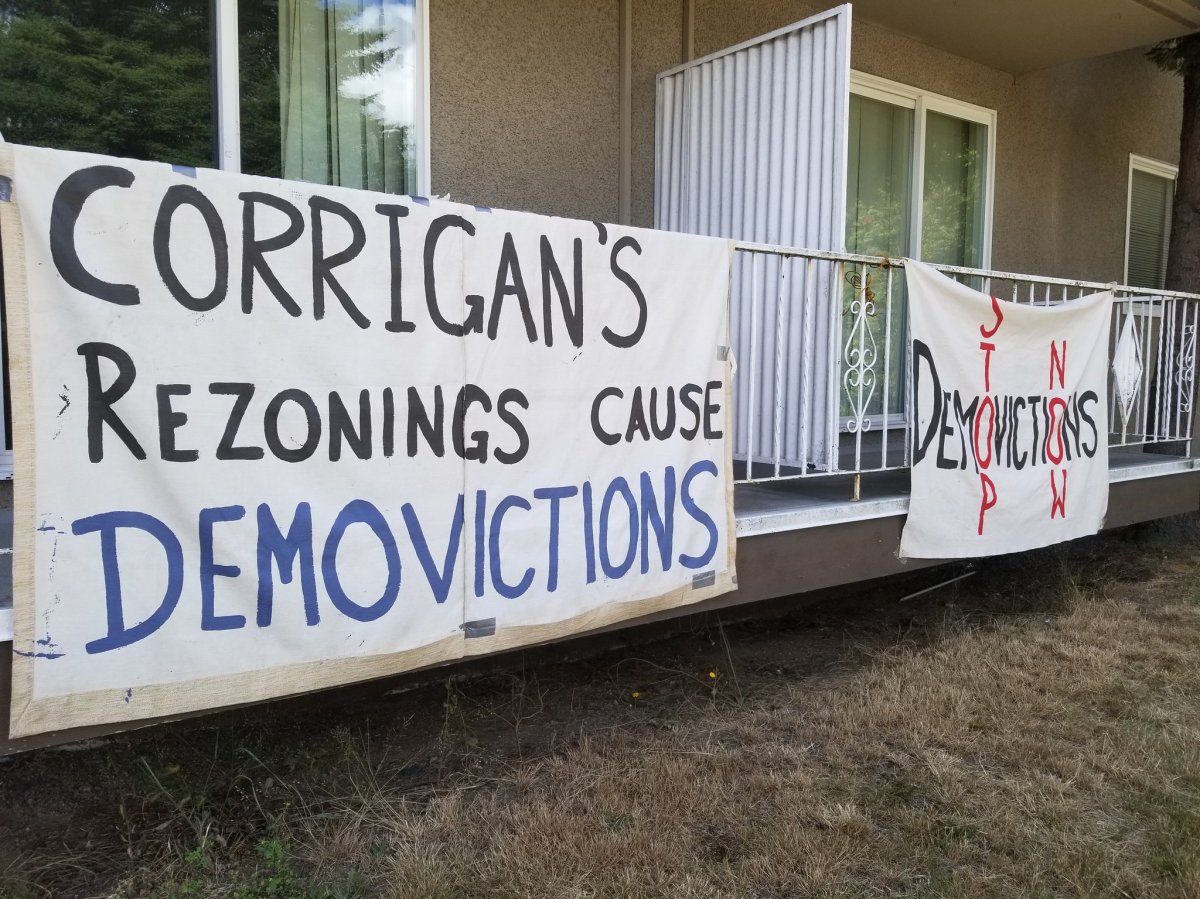 Anti-demoviction banners hung from a property on Sussex Avenue in Burnaby on July 1, 2018.