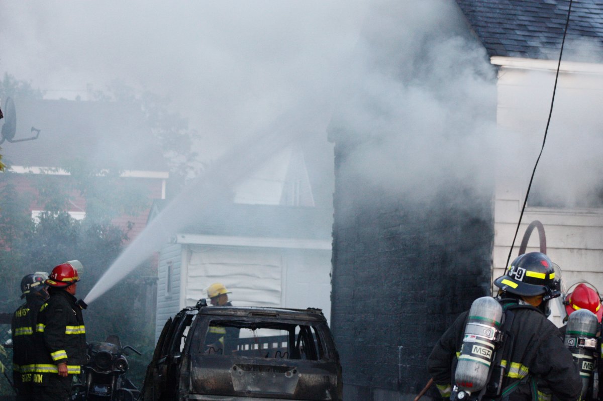 Four people escaped from a fire that damaged two bungalows in Amherst, N.S., on Monday.