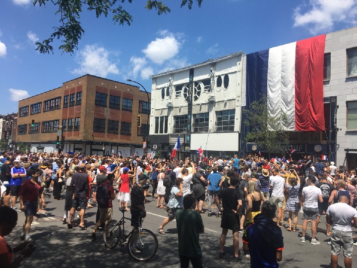 Soccer fans spill onto St-Denis Street in Montreal for an impromptu celebration following France's World Cup win against Croatia. Sunday, July 15, 2018.