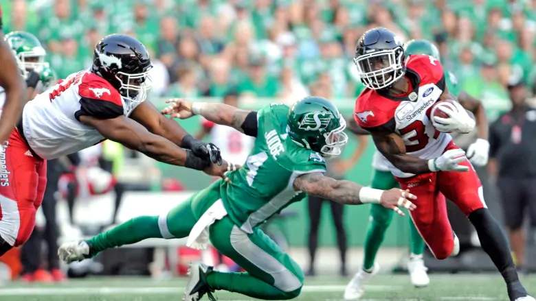 Calgary Stampeders running back Romar Morris shakes a tackle against the Saskatchewan Roughriders on Saturday.