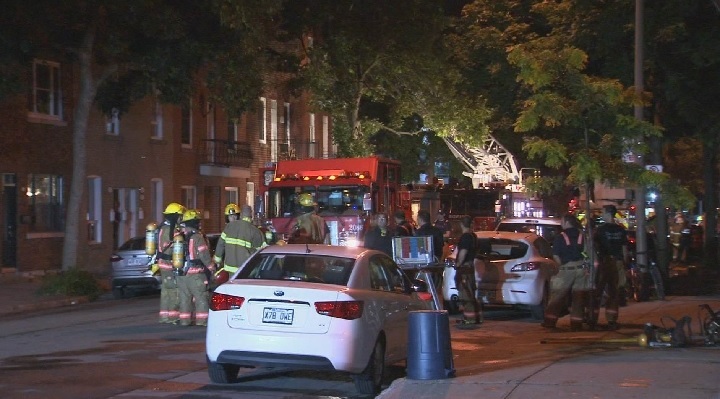 A Montreal firefighter was injured after he fell from a ladder while tackling a four-alarm blaze in a residential building in Hochelaga. Sunday, July 22, 2018.