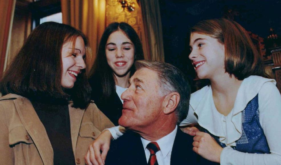 Ray Frenette, pictured on October 14, 1997, is shown surrounded by his three grandaughters following his swearing in ceremony as premier of New Brunswick in Fredericton.