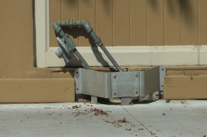 Officials say a man driving an ATV struck a natural gas riser in front of a building on Division Street in Cobourg.