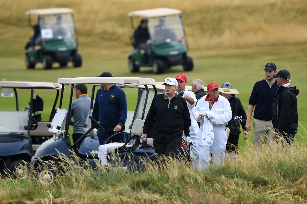  U.S. President Donald Trump plays a round of golf at Trump Turnberry Luxury Collection Resort during the U.S. President's first official visit to the United Kingdom on July 15, 2018 in Turnberry, Scotland.