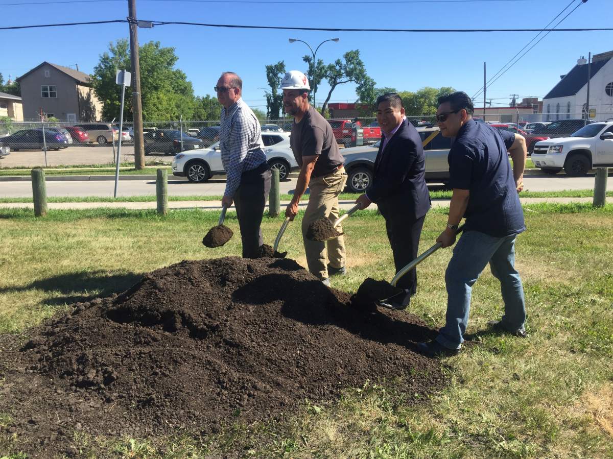Councillor Mike Pagtakhan, second from right, and Gord Dong, right, help break ground on Gord Dong Park's redevelopment.
