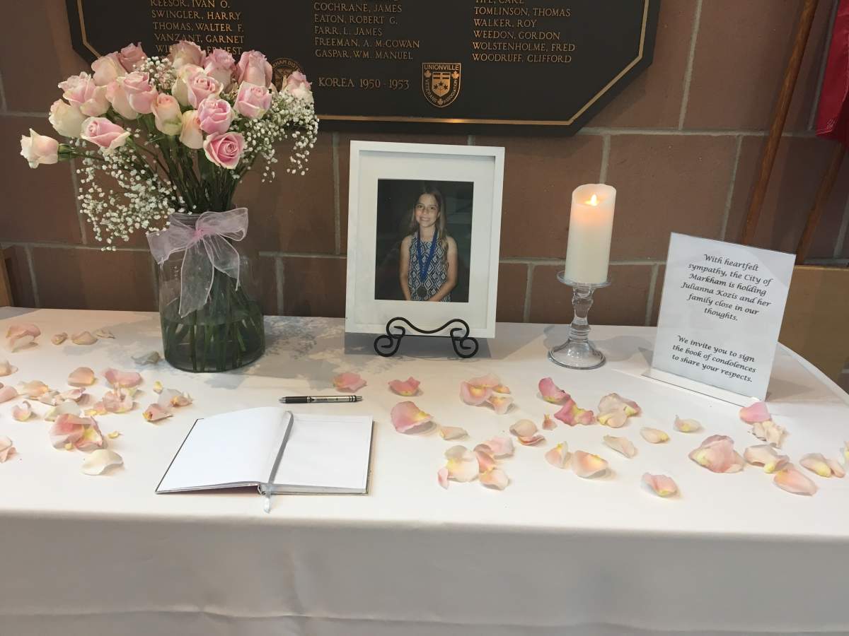 A book of condolences is set up at the Markham Civic Centre on July 25, 2018 for 10-year-old Julianna Kozis who was fatally shot in the Danforth shooting.