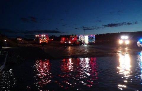 Emergency services at the shore of Ghost Lake west of Calgary, where 10 people had to be rescued after their boat sank. July 14, 2018.