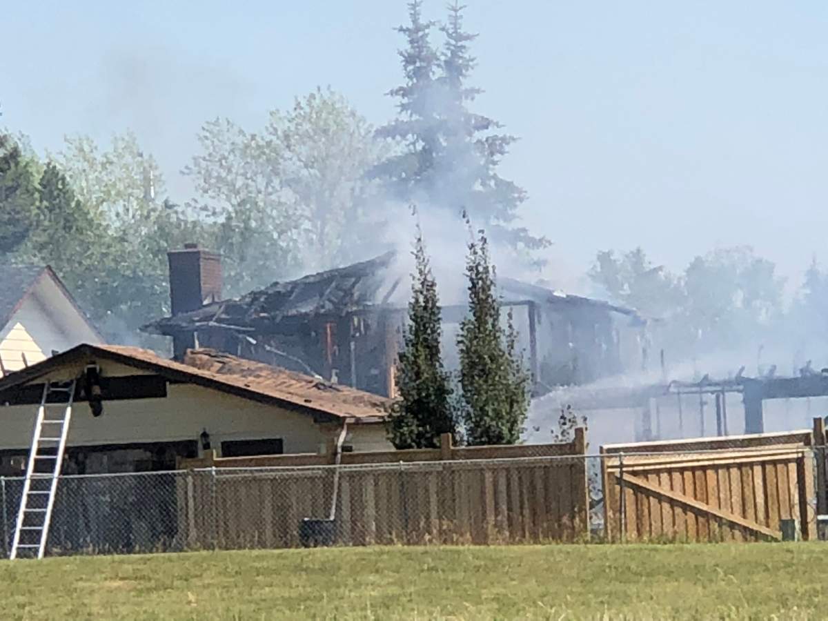 A home was destroyed by fire in Okotoks on Friday.