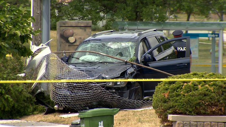 A crashed SUV at the scene of a fatal shooting on Islington Avenue, just north Finch Avenue Wednesday. 