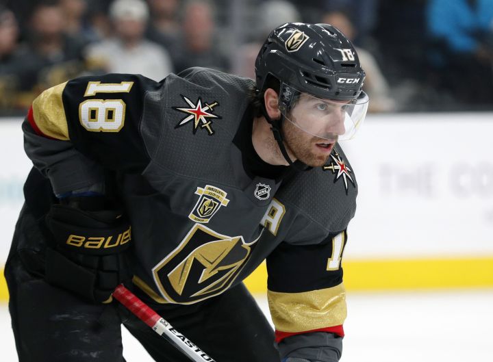 FILE - In this March 28, 2018, file photo, Vegas Golden Knights left wing James Neal (18) plays against the Arizona Coyotes during an NHL hockey game, in Las Vegas. The Calgary Flames have added a much-needed scorer to their lineup, signing proven scorer James Neal on Monday, July 2, 2018. The deal is worth $28.75 million over five years with an annual average salary of $5.75 million.