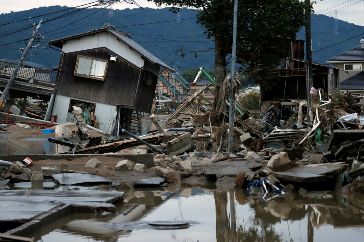 Submerged and destroyed houses are seen in a flooded area in Mabi town in Kurashiki, Okayama Prefecture, Japan, July 8, 2018.