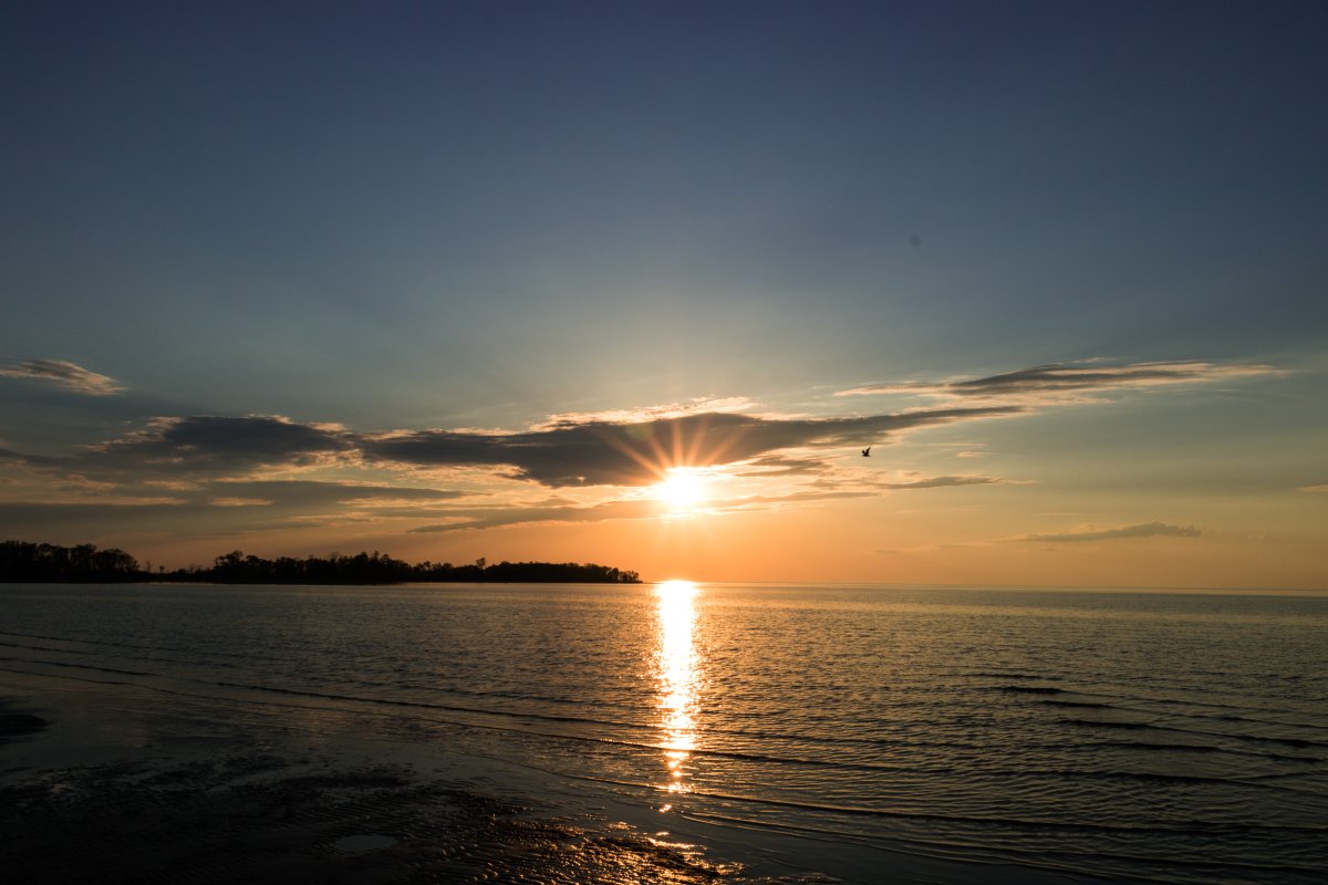 Sun setting over Patricia Beach, Manitoba.