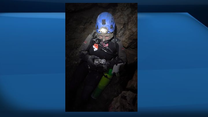 Kathleen Graham leads an expedition of Bisaro Anima, which she calls the deepest cave in Canada, near Fernie, B.C., in 2018. The Alberta-based explorer says her heart goes out to the members of a boys' soccer team as they await rescue from a partly flooded cave in Thailand. 