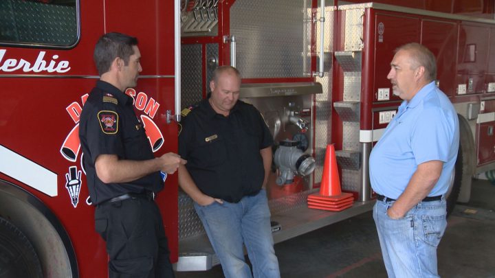 Deputy fire chief Don Willer, fire Chief Clayton Schilling and town resident Gord Cross.