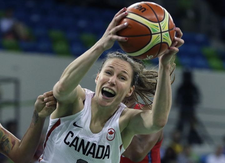 Canada guard Kim Gaucher pulls down a rebound during the first half of a women's basketball game against the United States at the Youth Center at the 2016 Summer Olympics in Rio de Janeiro, Brazil, Friday, Aug. 12, 2016. 