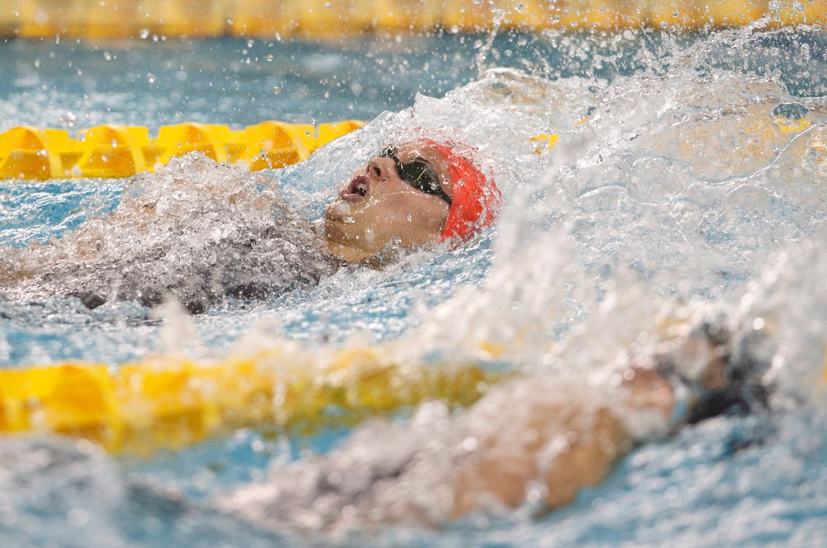 Kylie Masse wins the 100 meter backstroke during the 2018 Team Canada finals in Edmonton on Thursday, July 19, 2018. 