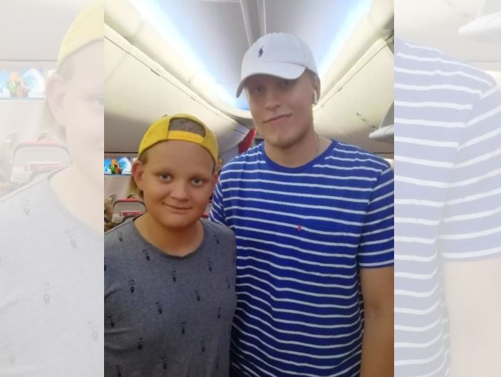 Patrik Laine posed for pictures with kids on the flight. 
