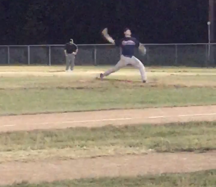 Kingston Ponies pitcher, Will Langford, throwing a pitch shortly after arriving at his game from a trip to the ER.
