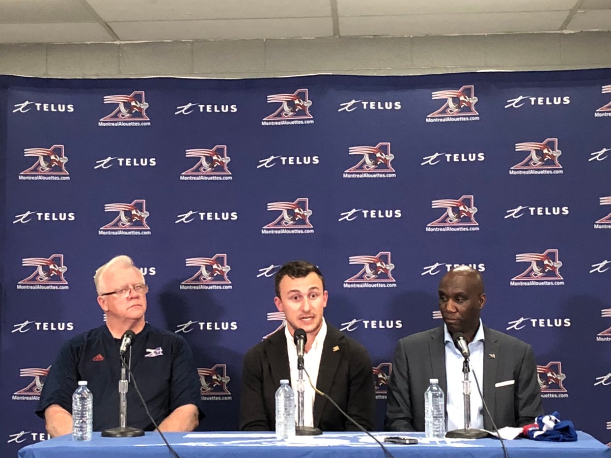 Johnny Manziel flanked by the Montreal Alouettes coach Mike Sherman to the left and the team's general manager Kavis Reid to the right. Monday July 23, 2018.