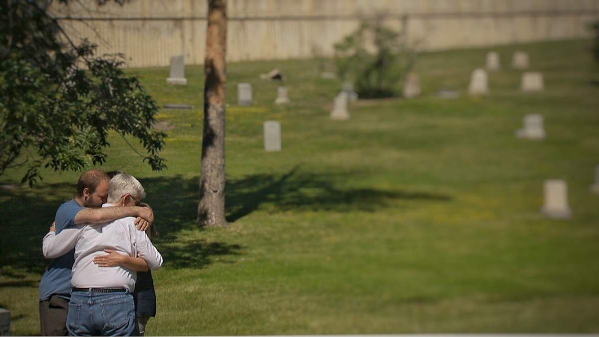 Advocates for a homeless memorial gather at Union Cemetery in Calgary.