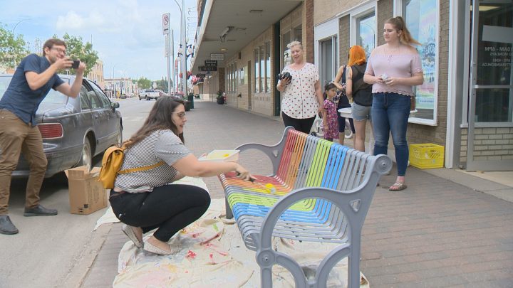 Gearing up for the 25th anniversary of Pride week, members of Moose Jaw Pride invited the community on Friday to help paint the bench outside of Rainbow Retro Thrift Shop with Pride colours. 