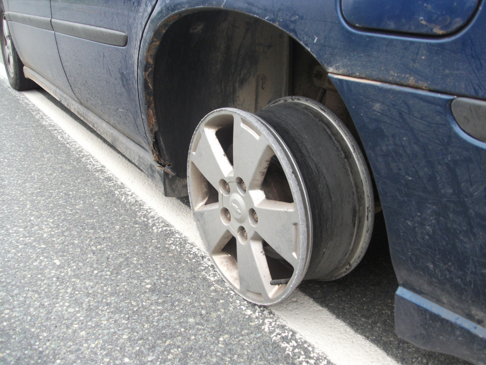 A suspected impaired driver was stopped by police in Cape Breton driving without a rear left wheel.
