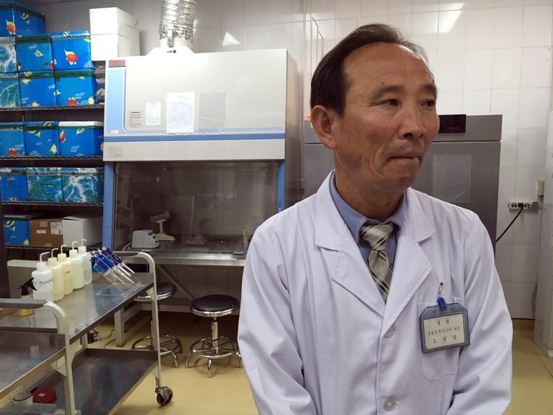 In this May 7, 2018, photo, Doctor O Yong Il explains how patients are diagnosed at the National Tuberculosis Reference Laboratory in Pyongyang, North Korea. 