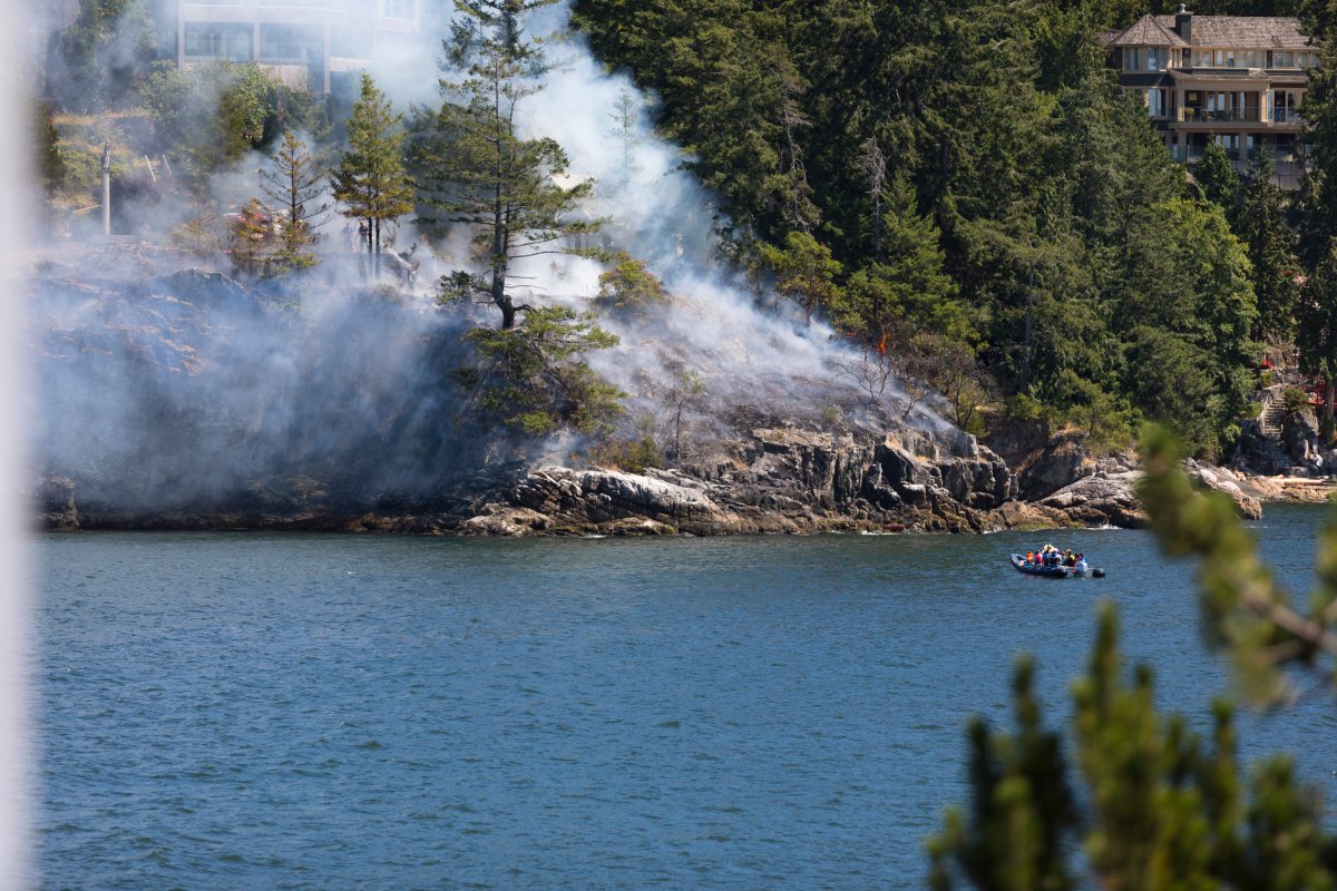 Smoke seen pouring from a brush fire on the West Vancouver waterfront on Friday, July 20. 