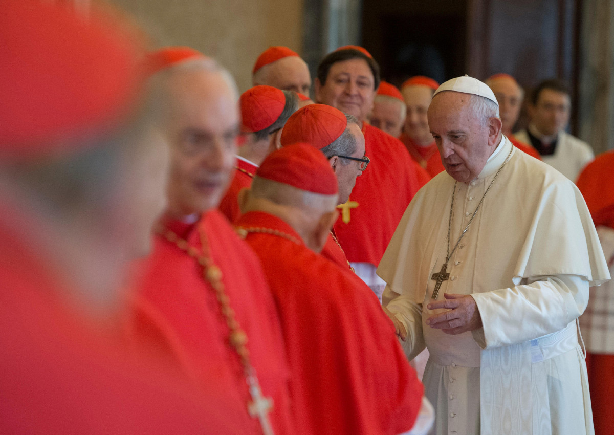 Pope Francis talks with cardinals during a consistory meeting at the Vatican July 19, 2018.