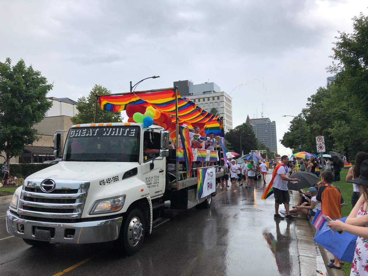 The parade enters into its final stretch on Wellington Street, just east of Victoria Park.