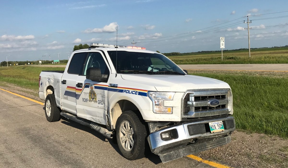 RCMP in Lac Du Bonnet said one of it's trucks was damaged after it was allegedly rammed by a driver who is also accused of throwing an axe at officers. 