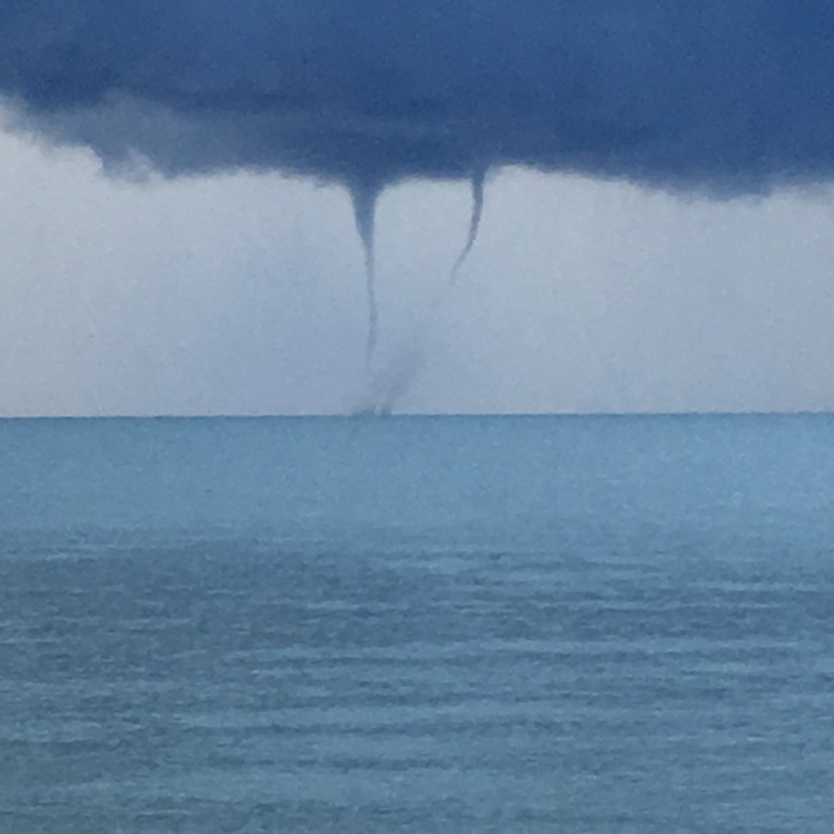 Funnel clouds over Twin Lakes Beach on Lake Manitoba.