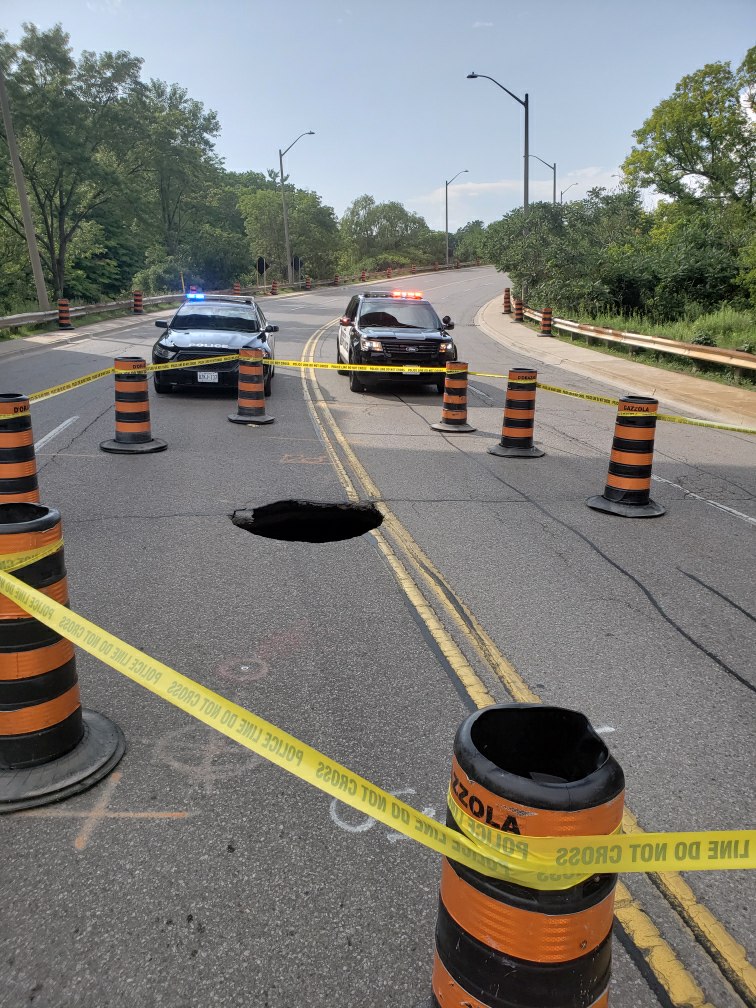 A portion of Cross Avenue in Oakville has been closed.. thanks to a giant sinkhole.