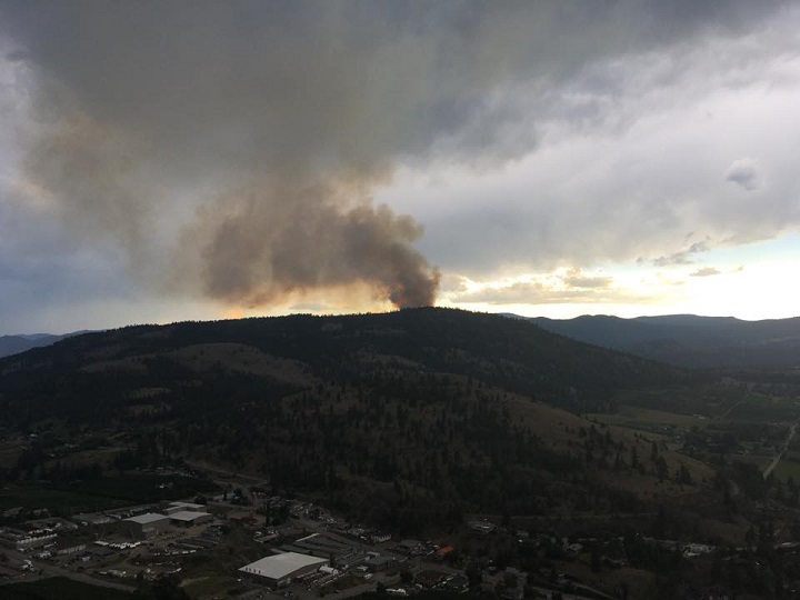 Smoke rises from the Mount Conkle fire southwest of Summerland.