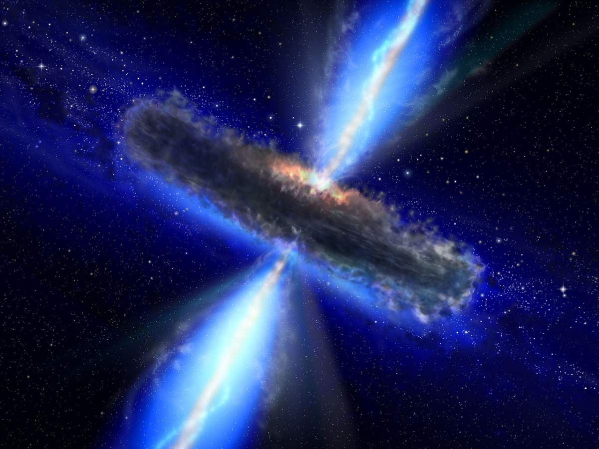 This artist’s impression shows the dust torus around a super-massive black hole. Black holes lurk at the centres of active galaxies in environments not unlike those found in violent tornadoes on Earth. Just as in a tornado, where debris is often found spinning about the vortex, so in a black hole, a dust torus surrounds its waist.