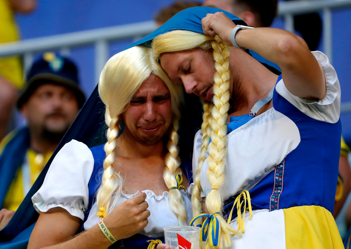 Fans of Sweden react after the FIFA World Cup 2018 quarter final soccer match between Sweden and England in Samara.