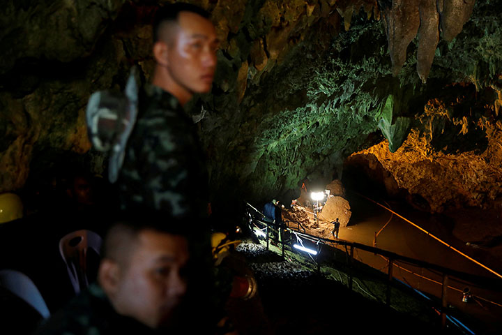 Soldiers and rescue workers work in Tham Luang cave complex, as an ongoing search for members of an under-16 soccer team and their coach continues, in the northern province of Chiang Rai, Thailand, July 1, 2018.