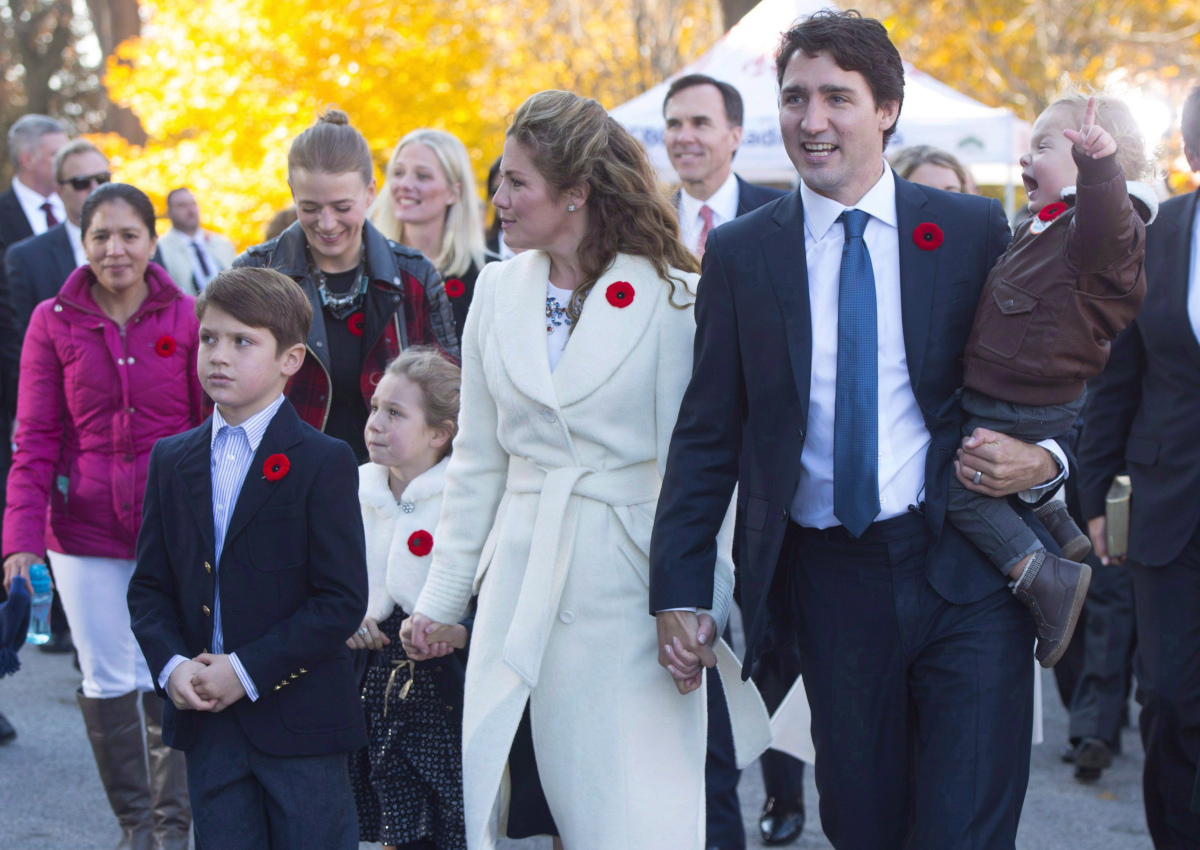 Marylou Trayvilla, one of two women employed to take care of the Trudeau children, is seen at left as she joins prime minister-designate Justin Trudeau and family upon their arrival to Rideau Hall for the swearing-in ceremony in Ottawa on Wednesday, November 4, 2015.