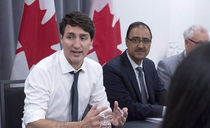 Prime Minister Justin Trudeau and Amarjeet Sohi, the minister of Infrastructure and Communities, meet with municipal leaders at the Federation of Canadian Municipalities' 2018 Annual Conference in Halifax on Friday, June 1, 2018. 